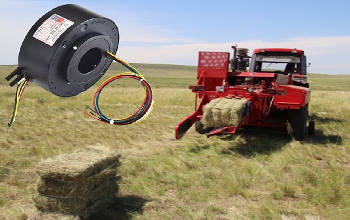 CENO slip ring for straw bale piler